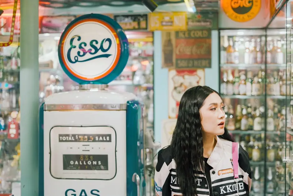 Young woman explores a vintage supermarket featuring a retro Esso gas pump and nostalgic decor.