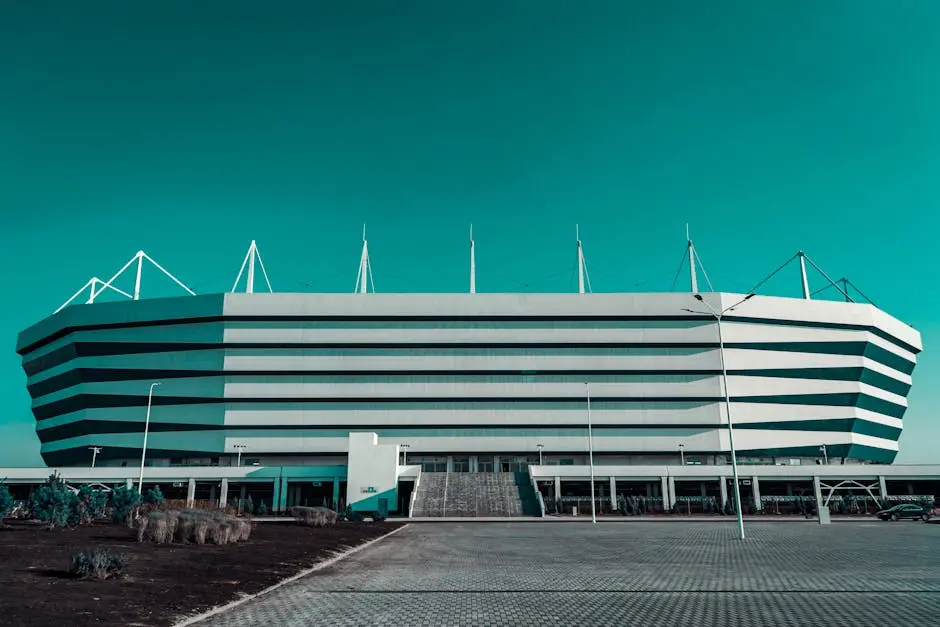 Front view of a modern stadium with unique architectural design captured outdoors.