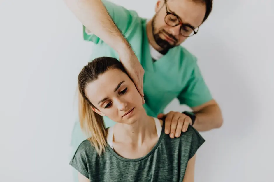 Professional chiropractor treating a woman&rsquo;s neck pain with therapeutic techniques.