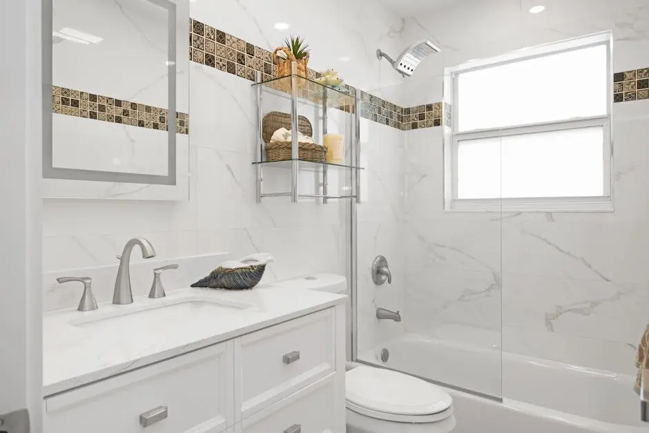 Contemporary bathroom with clean design, marble tiles, and sleek fixtures.