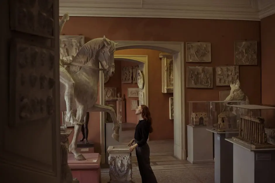 Woman admiring a horse sculpture in an art museum, surrounded by classical artworks.