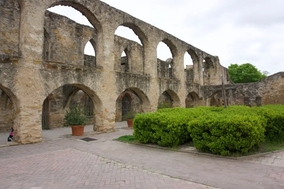 Explore the historic arched stone facade at San Antonio Missions National Historical Park.