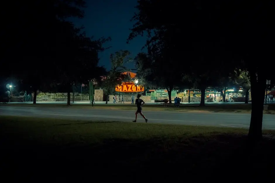 A lone jogger runs through a dimly lit park in Hermosillo at night.