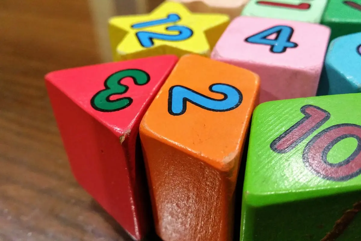 Close-up view of colorful wooden blocks with numbers for educational use.