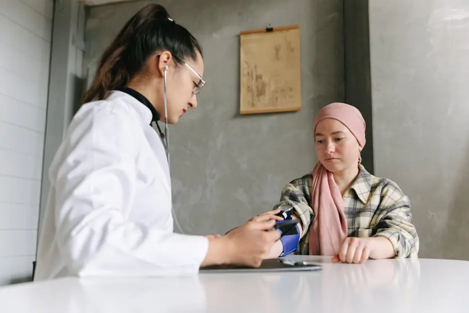 A medical professional checks a patient’s blood pressure, depicting a caring healthcare environment.