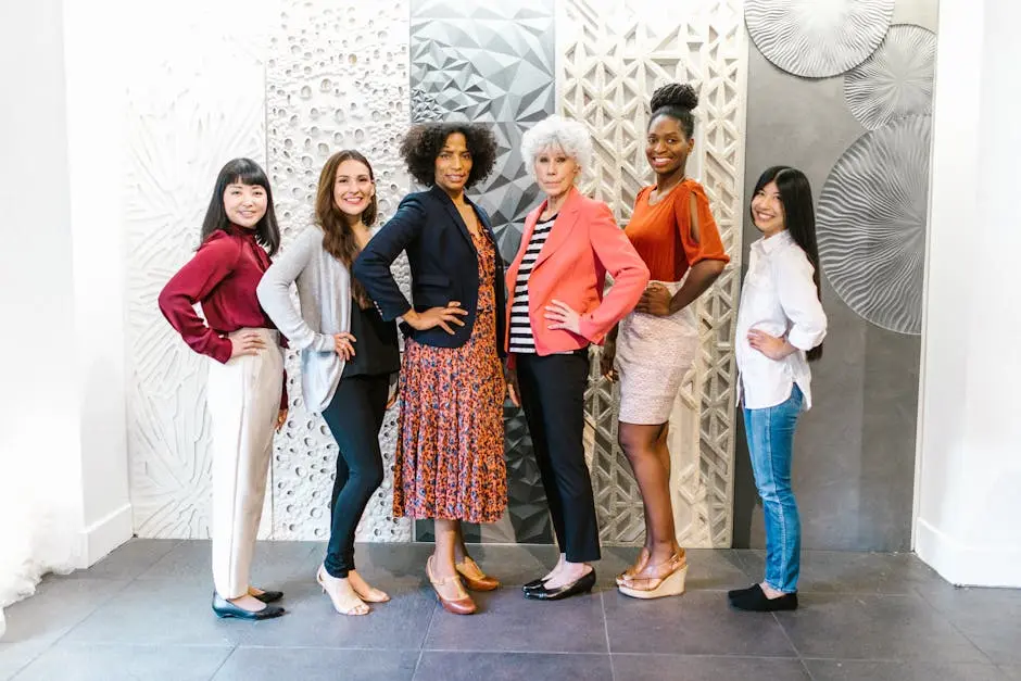 Group of confident women leaders posing in a stylish, modern office environment, showcasing empowerment and diversity.