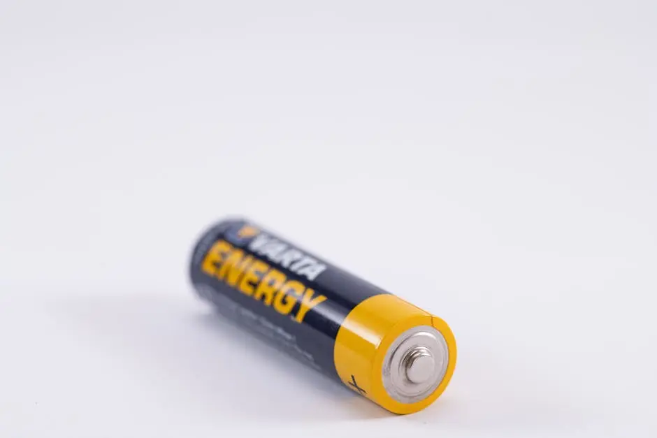 Detailed close-up of a single Varta Energy AA battery on a white background.