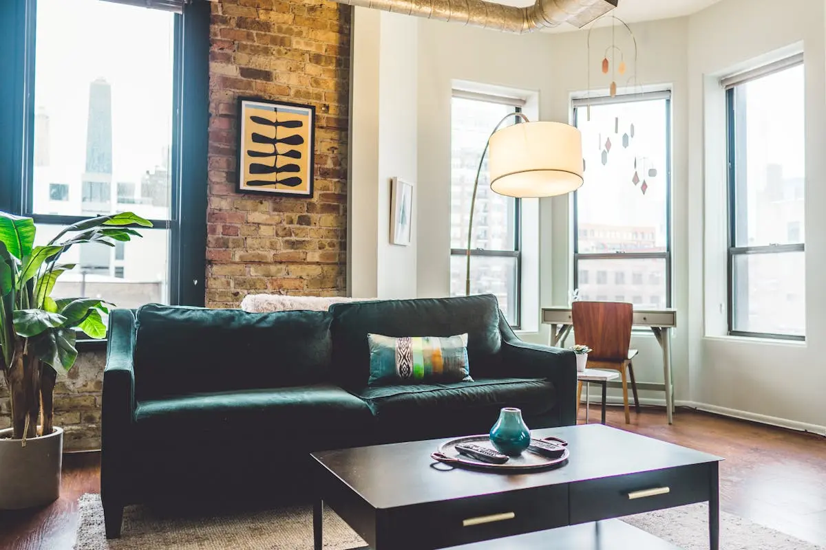 Contemporary living room with elegant decor and cozy furniture in urban setting.