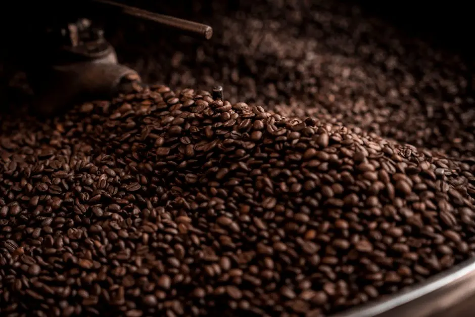 High-quality close-up image of freshly roasted coffee beans cooling in a café environment.
