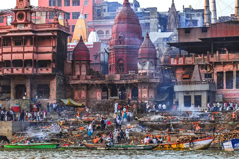 A vibrant scene of rituals at Manikarnika Ghat in Varanasi, showcasing traditional Hindu customs along the Ganges River.