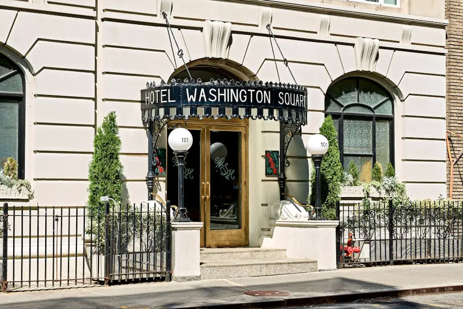 Elegant entrance of Hotel Washington Square, capturing classic New York architectural charm.