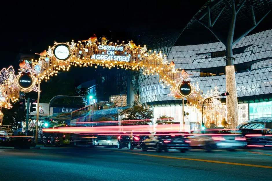 Orchard Road adorned with vibrant Christmas lights displaying &lsquo;Christmas on a Great Street&rsquo;.