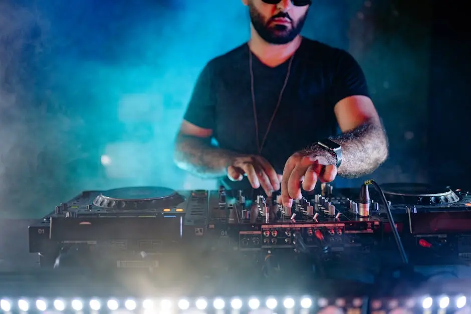 Vibrant DJ performance captured with colorful lights and smoke, showcasing night life energy.