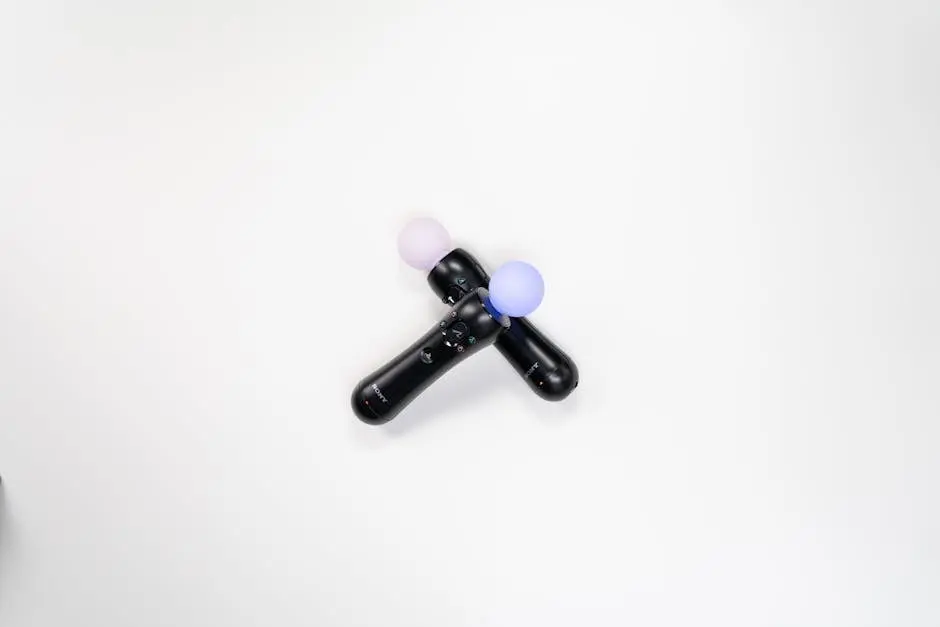 Two black gaming controllers with illuminated buttons on a white background.