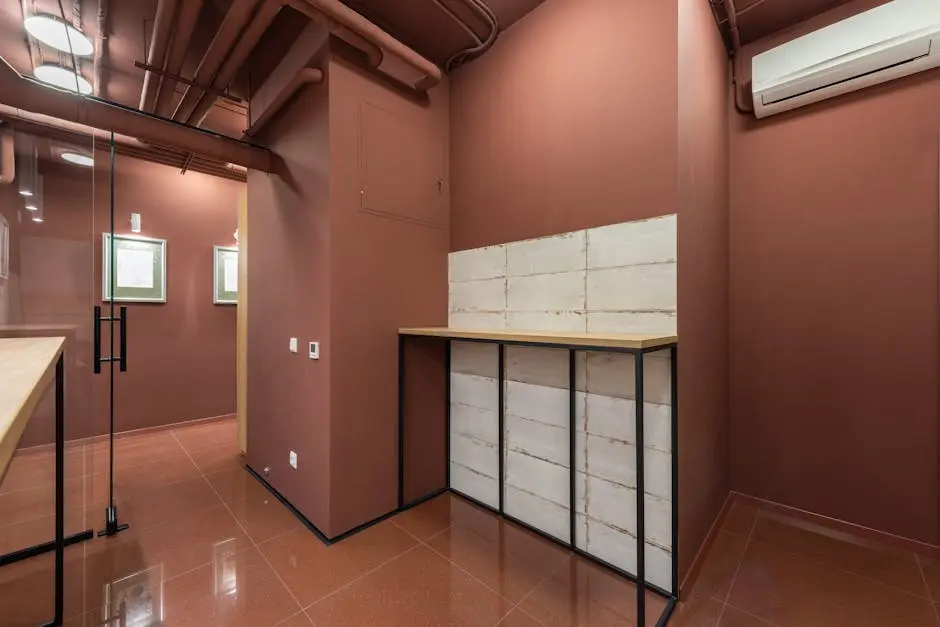 A sleek modern office with a minimalist design focusing on earthy tones and natural light.