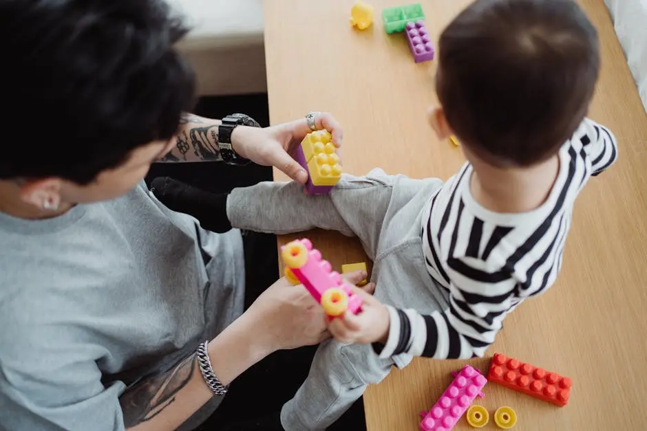 Father and child bonding over colorful building blocks indoors, fostering creativity and connection.