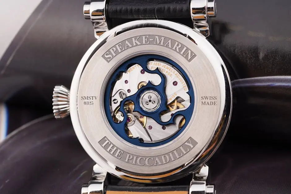 Close-up of a luxurious Speake-Marin watch showcasing intricate watchmaking mechanism.