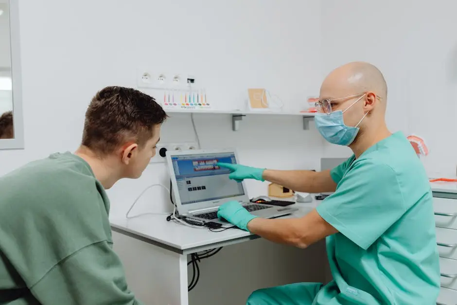 Dentist and patient discussing a treatment plan using digital images.