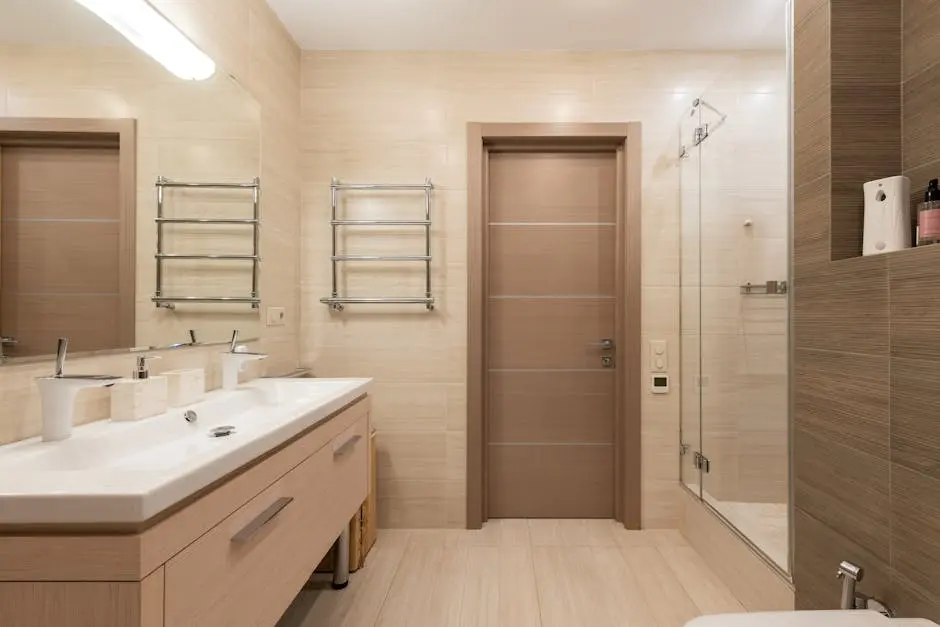 Spacious contemporary bathroom featuring sleek design and luxury amenities.