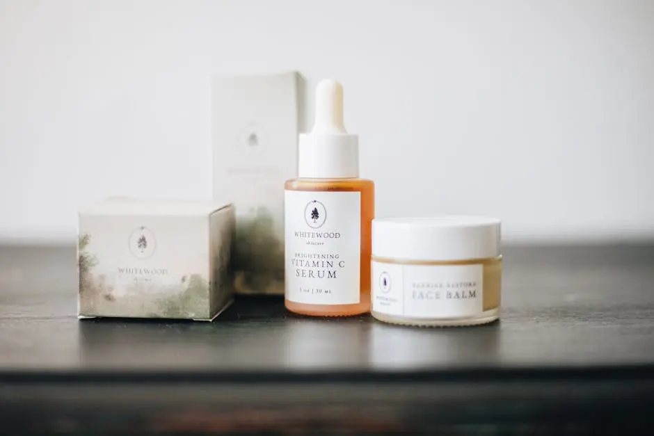 A serene presentation of vitamin C serum and face balm showcasing a minimalist skincare collection.