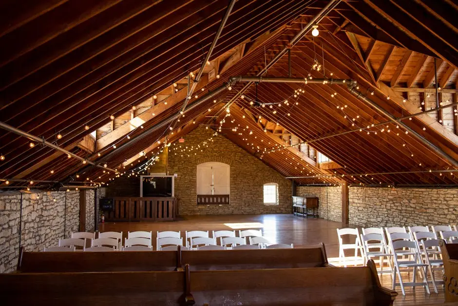 Cozy rustic chapel with wooden beams and ambient string lighting, perfect for intimate gatherings.