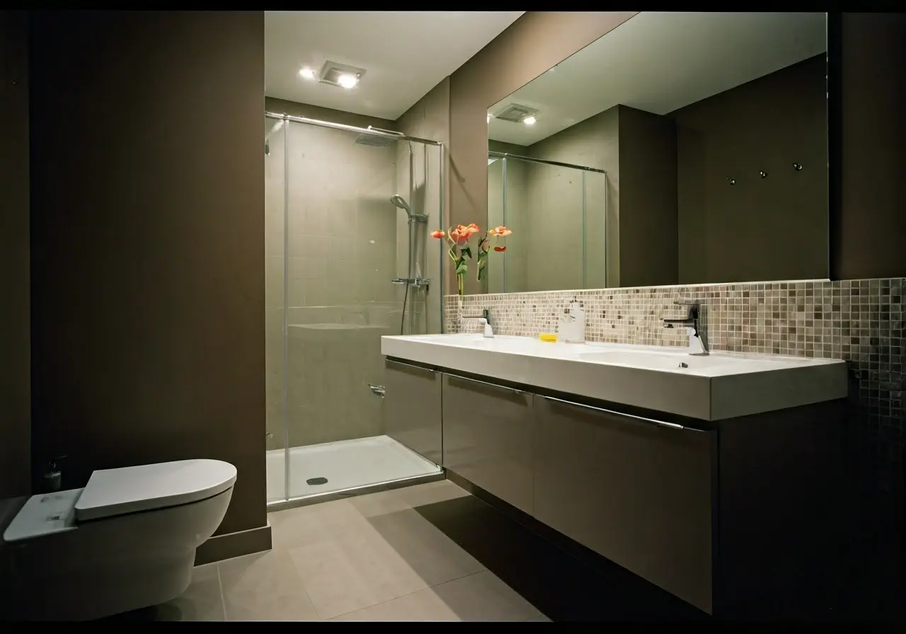 A modern bathroom with sleek fixtures and elegant decor. 35mm stock photo