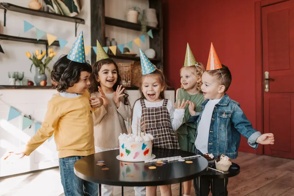 Children enjoying a birthday party with cake and colorful party hats, celebrating together indoors.