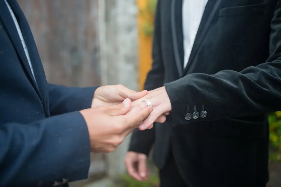 A romantic close-up capturing a couple exchanging rings, signifying love and commitment.