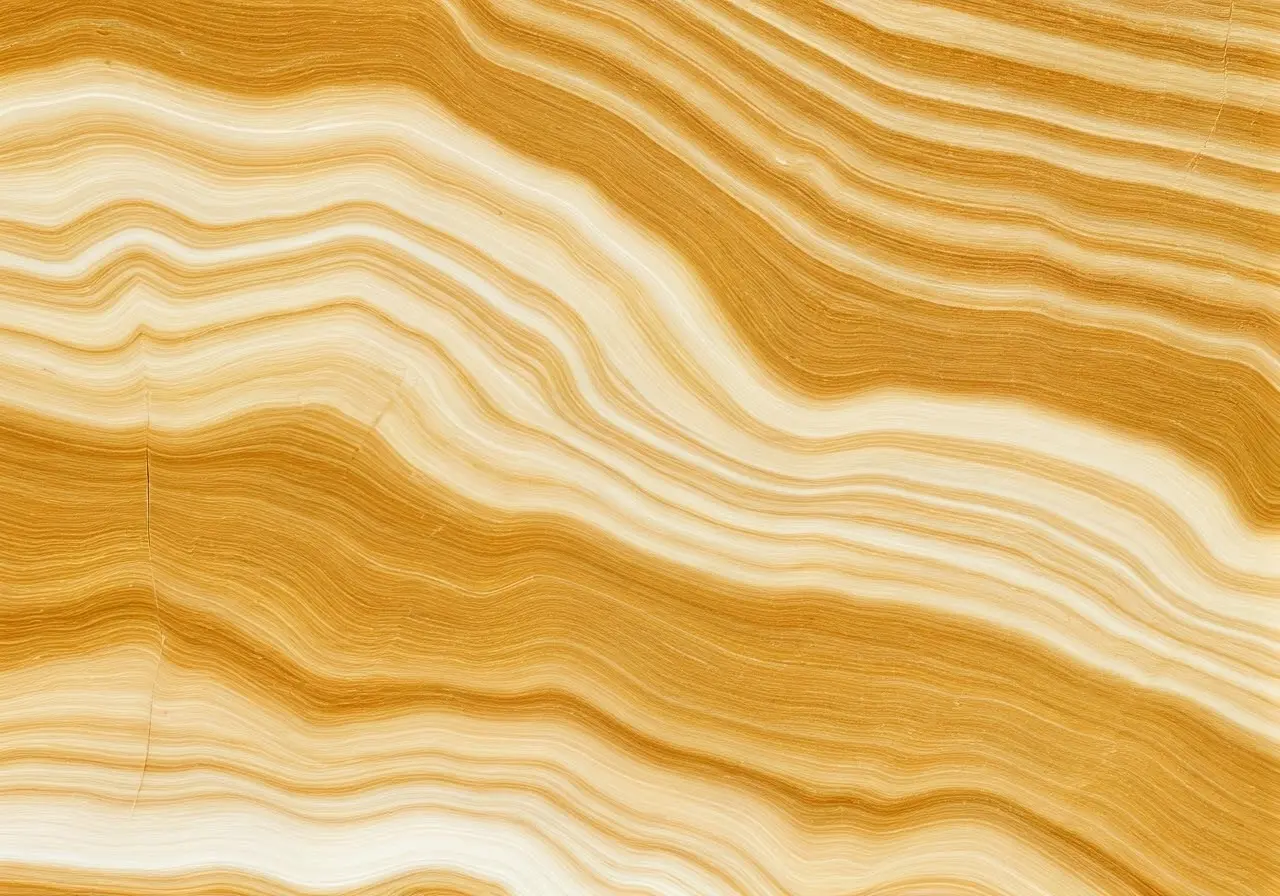 A close-up of Calacatta Gold marble with elegant veining. 35mm stock photo