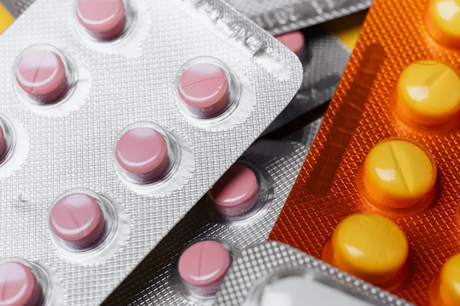 Detailed view of colorful blister packs containing different pills and medications.