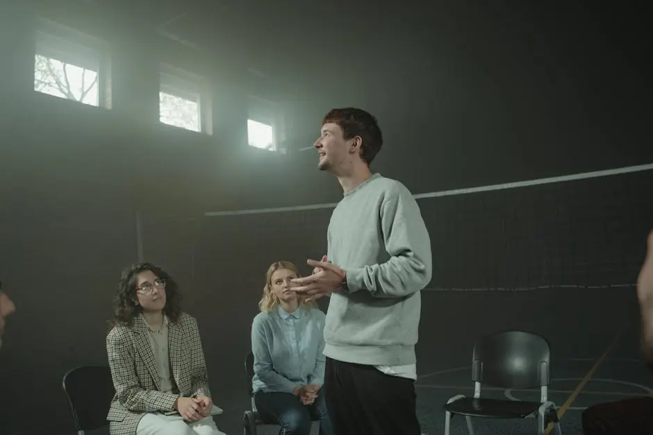 A group therapy session with three adults discussing mental health issues indoors.