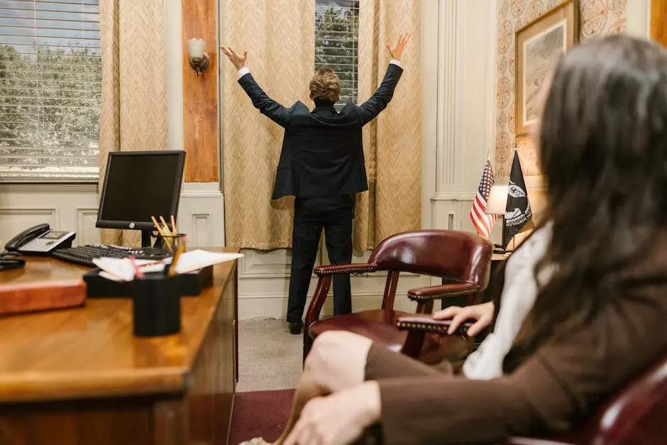 Two professionals in a lawyer’s office engaged in a tense negotiation.