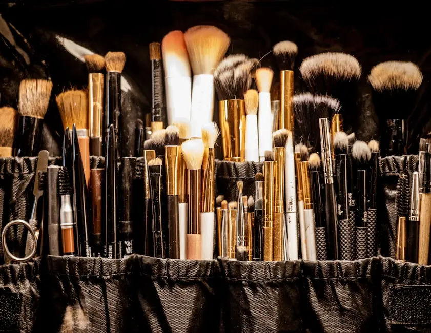 A diverse set of makeup brushes neatly arranged in a professional case, showcasing variety and quality.
