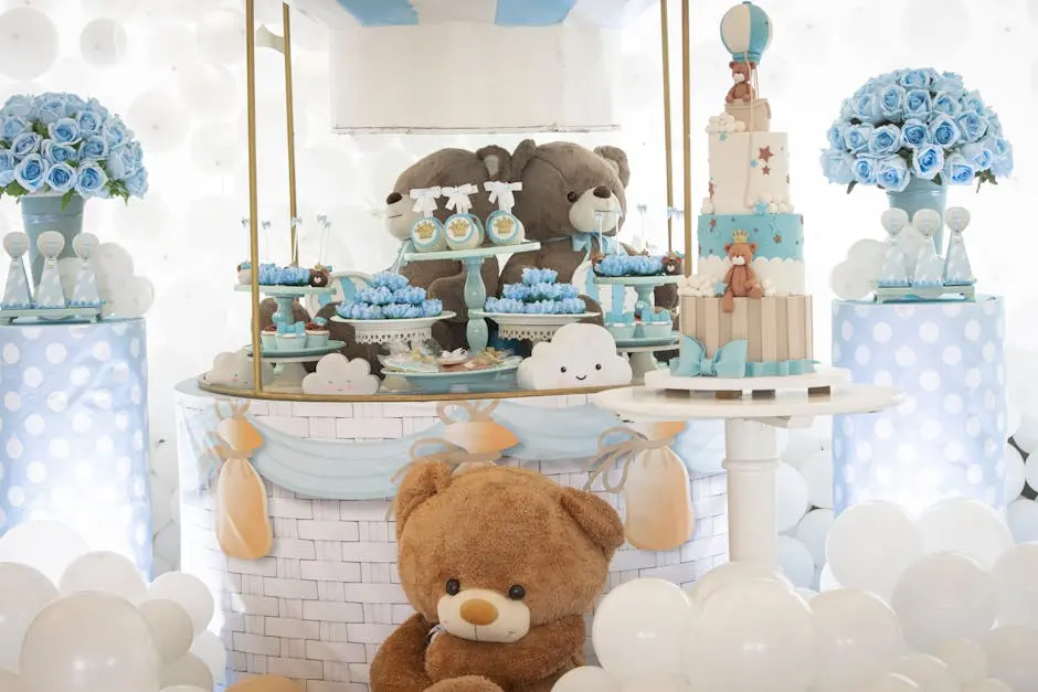 Elegant baby shower setup featuring teddy bears, balloons, and a cake with blue floral arrangements.