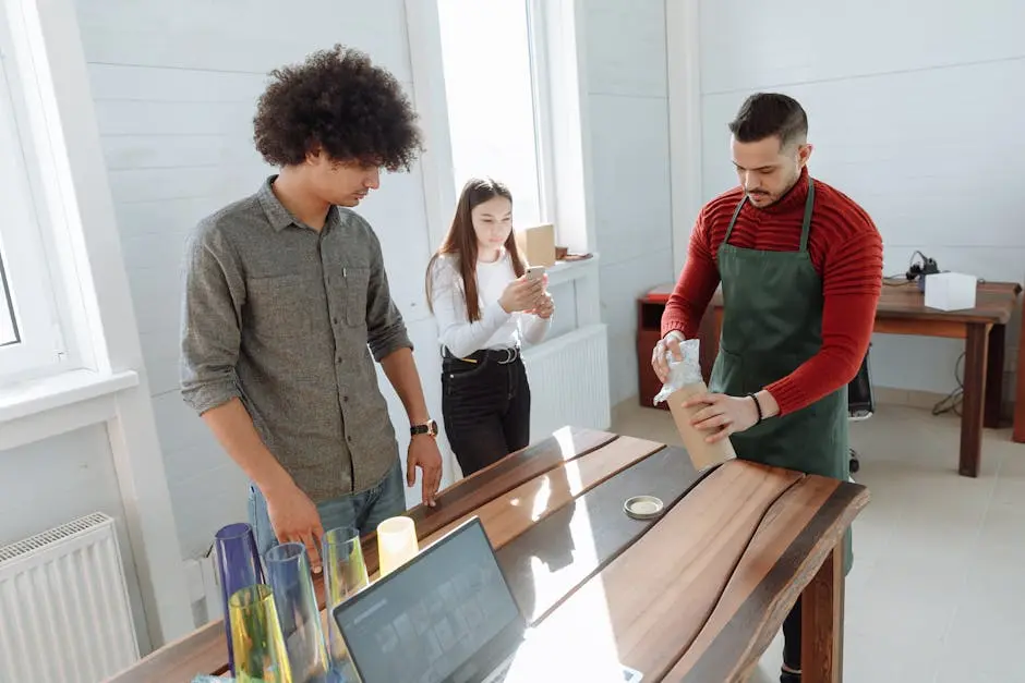 Young professionals in a modern workspace collaborating on packaging design.
