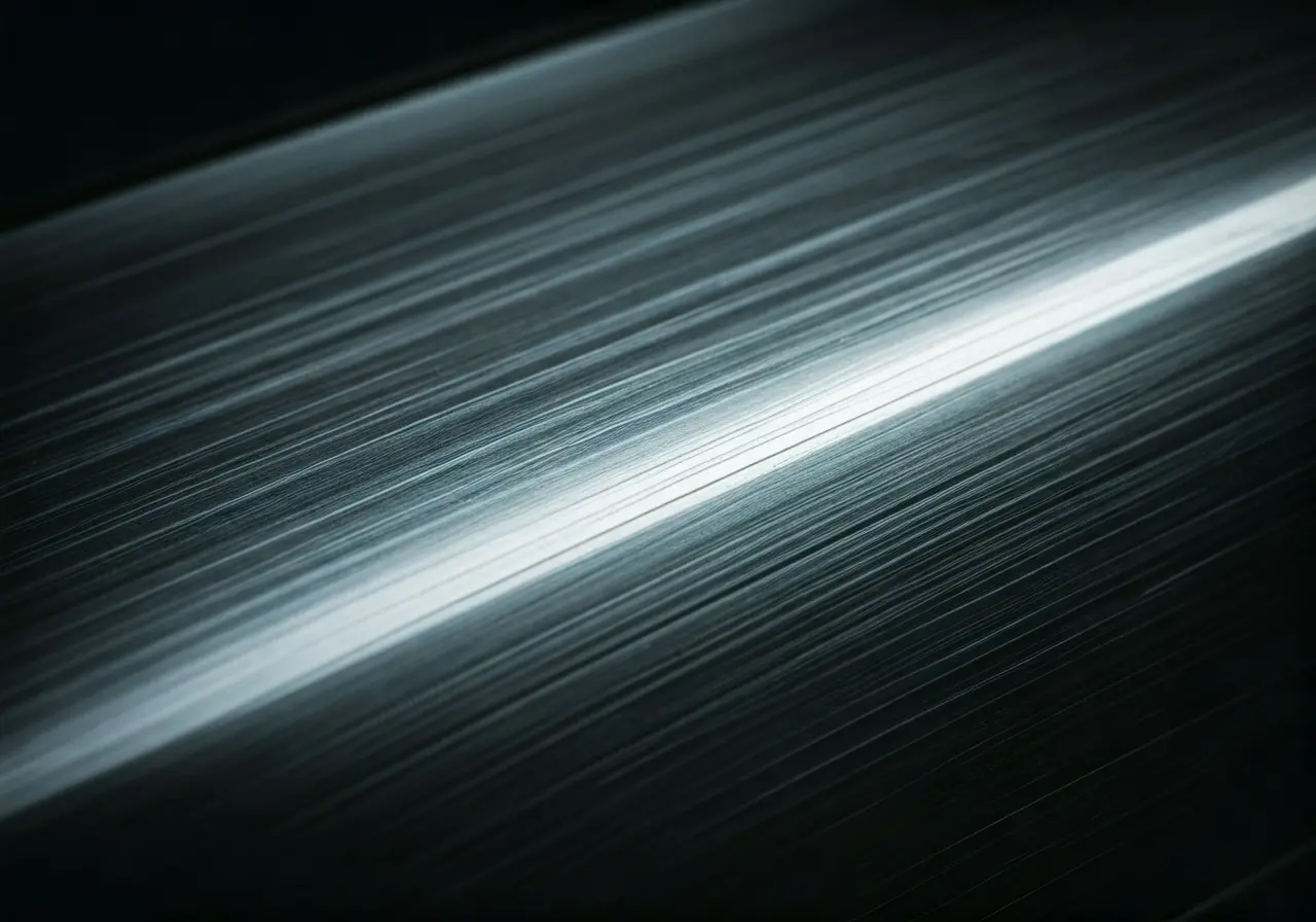 A close-up of car paint showing scratches and reflections. 35mm stock photo