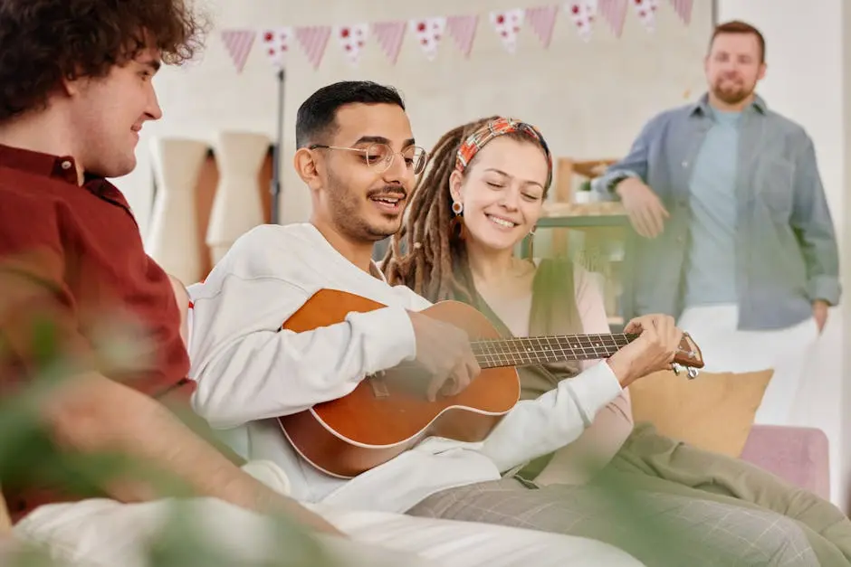 A group of friends enjoying music together indoors, showcasing diversity and joy.