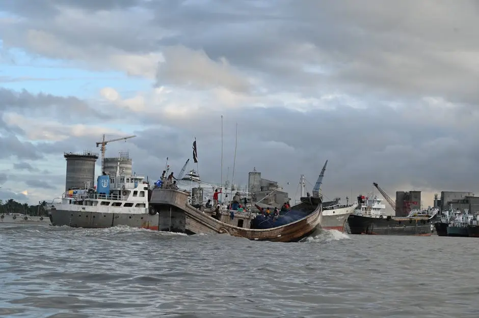 Dynamic scene of cargo ships at Chattogram port in Bangladesh, showcasing maritime activity.
