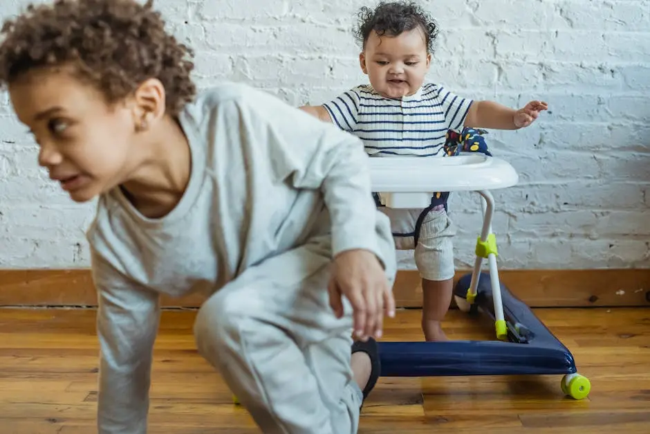 Two young children enjoying playtime together in a cozy indoor setting, exploring and bonding joyfully.
