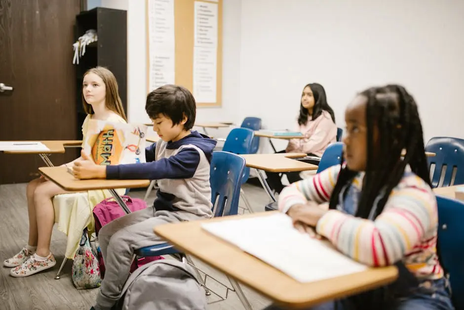 Children focused on a lesson in a diverse classroom environment fostering inclusivity.
