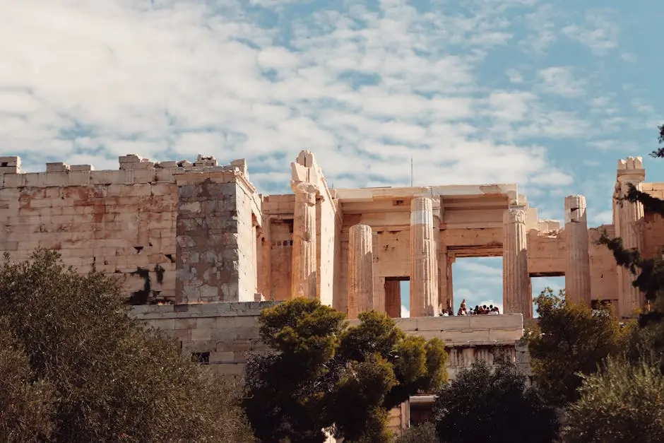 Explore the majestic ancient columns of the Acropolis in Athens, Greece.