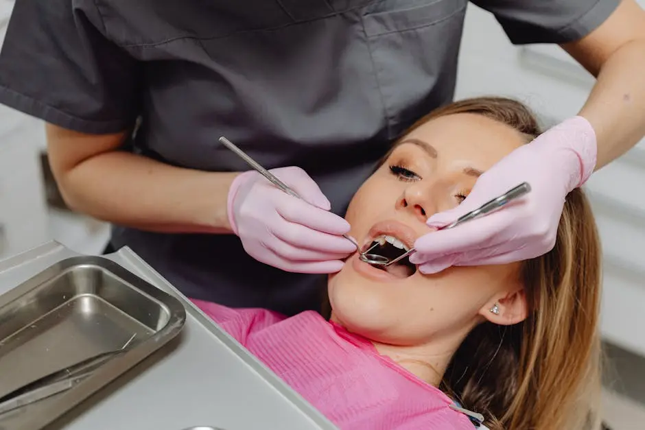 Dentist performing check-up on female patient in a clinic setting, emphasizing dental care.