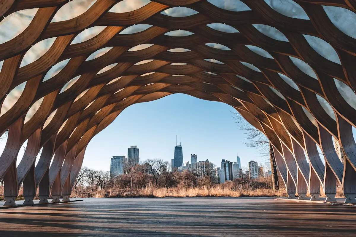 Stunning modern structure framing the Chicago skyline, a perfect blend of architecture and nature.