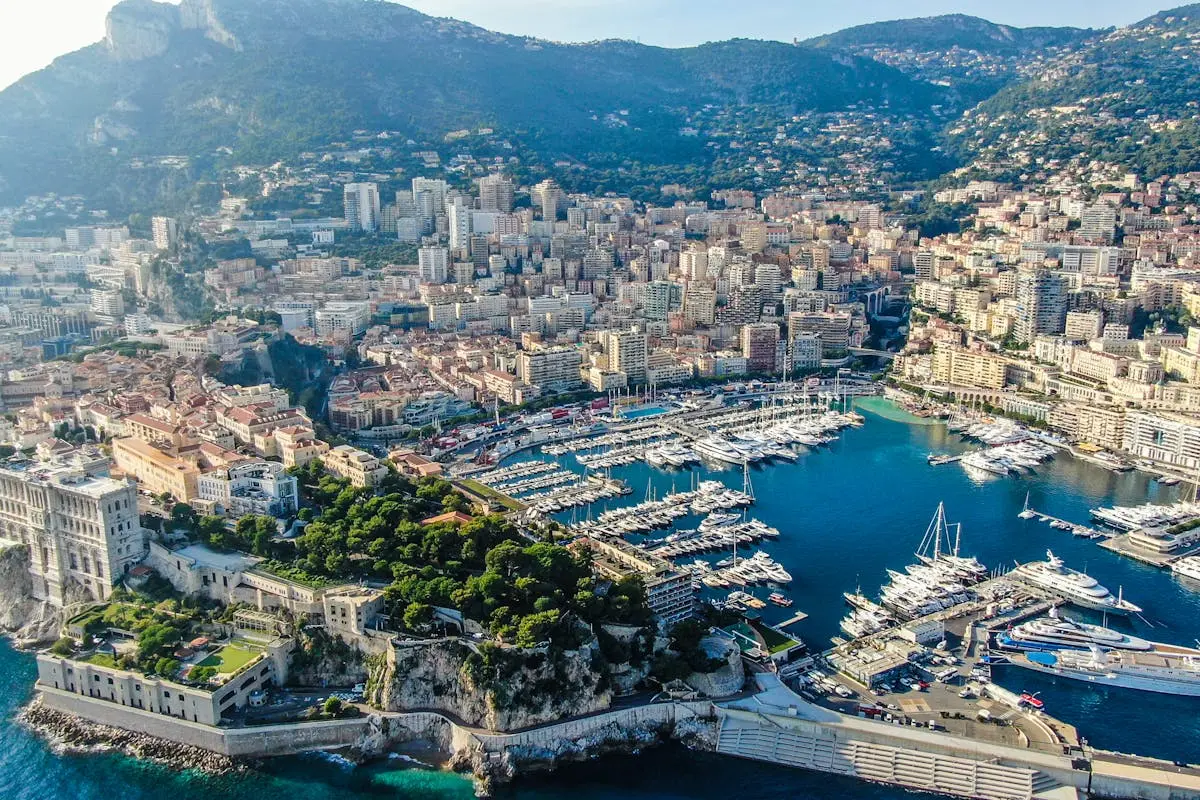 A stunning aerial view of Monte Carlo with its vibrant harbor and skyline.