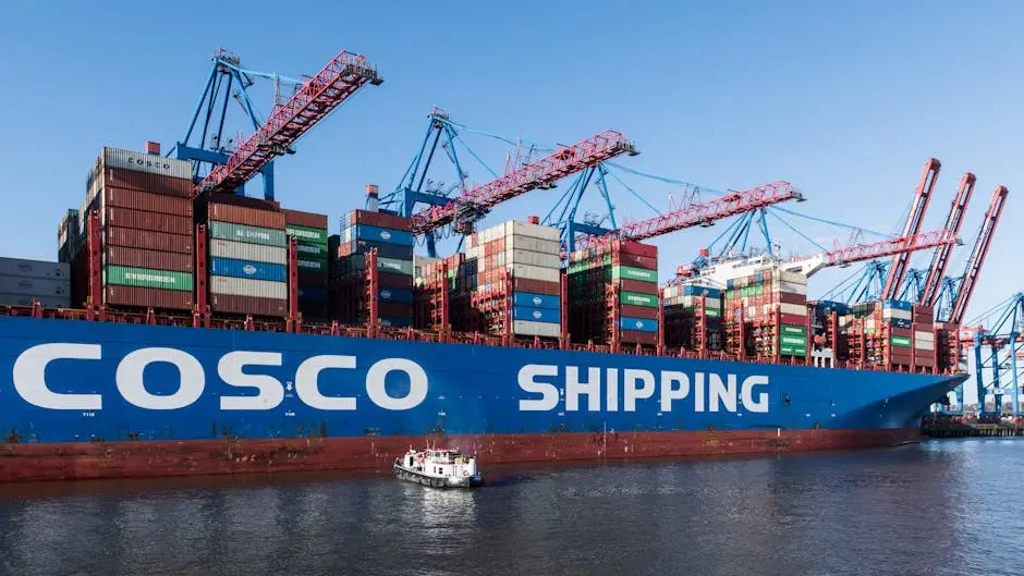 Container ship docked at Hamburg Port showing global trade and shipping logistics.