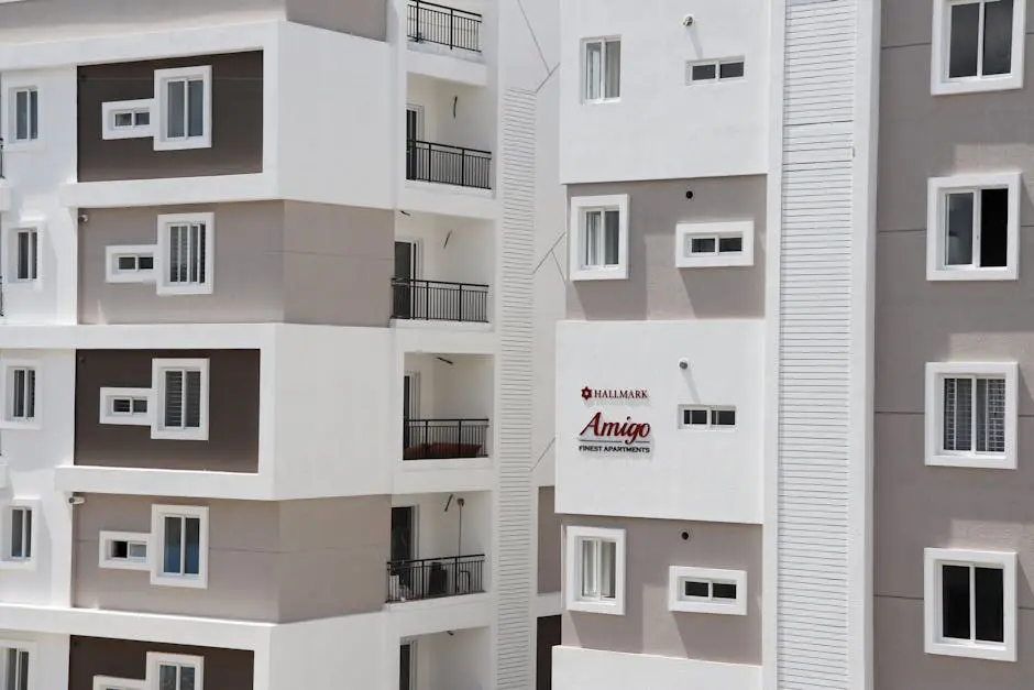 Contemporary apartment complex with balconies and modern architectural design.