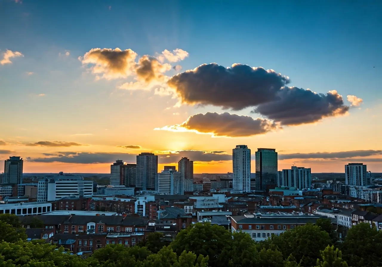 A sunset view over Birmingham skyline with heart-shaped clouds. 35mm stock photo