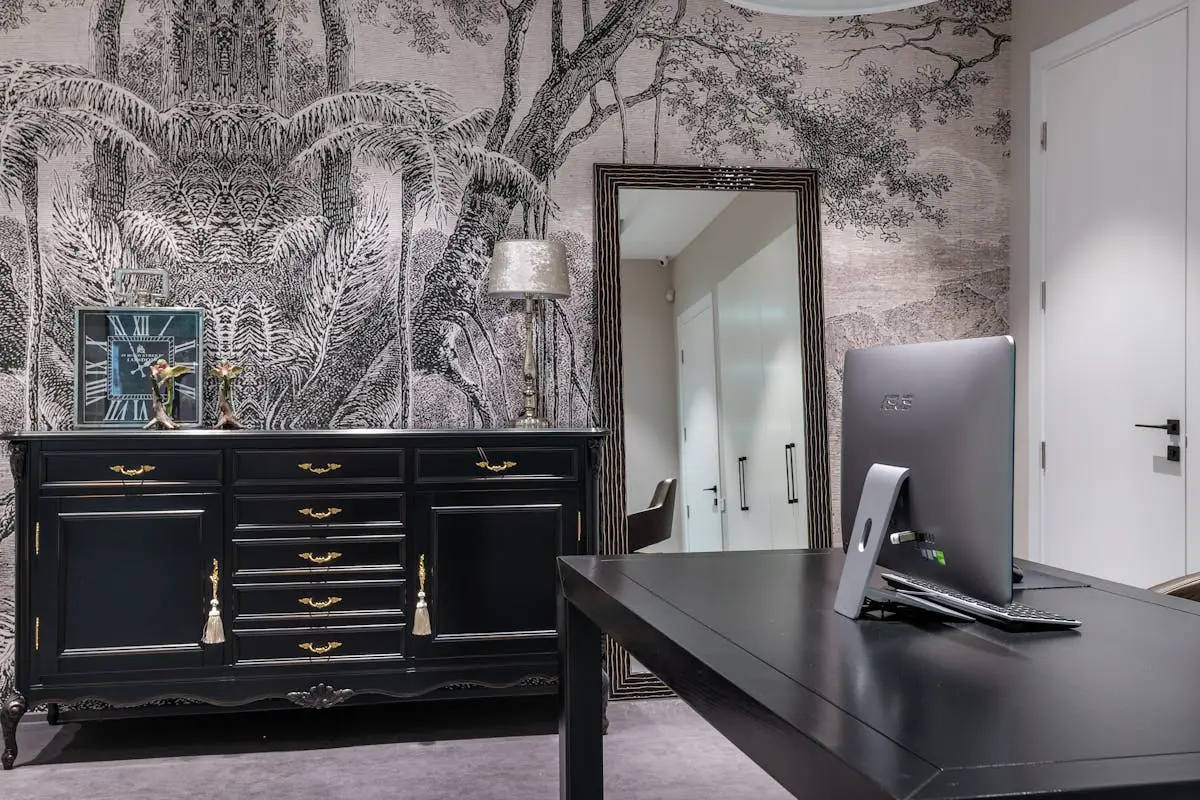 Stylish office interior featuring a vintage decor theme with a modern workspace setup for productivity.