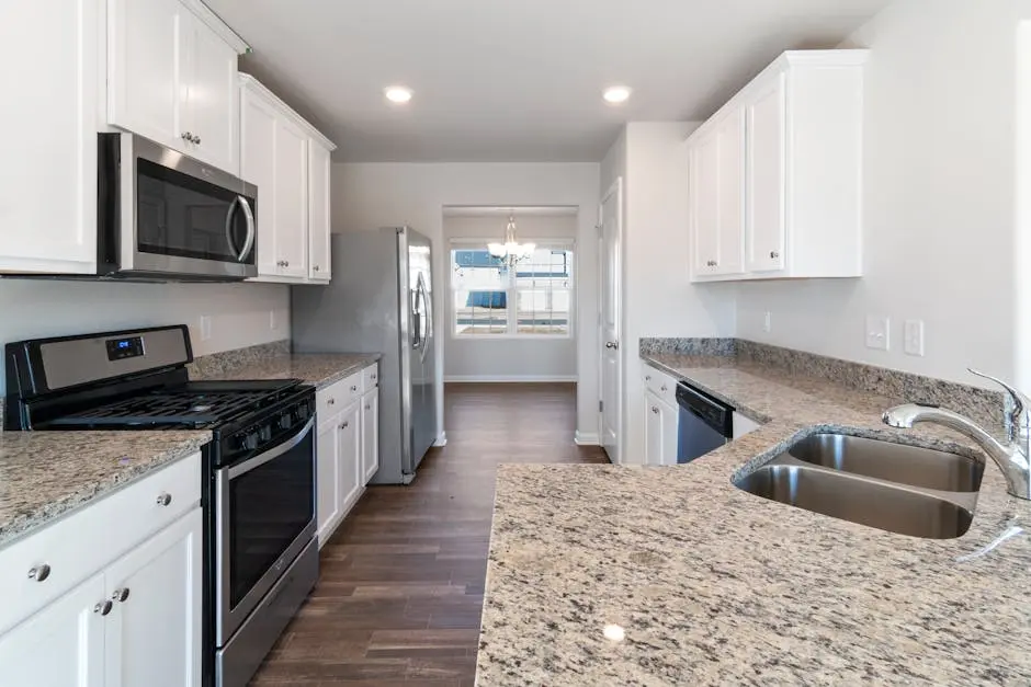 Bright and spacious kitchen featuring modern appliances and granite countertops.