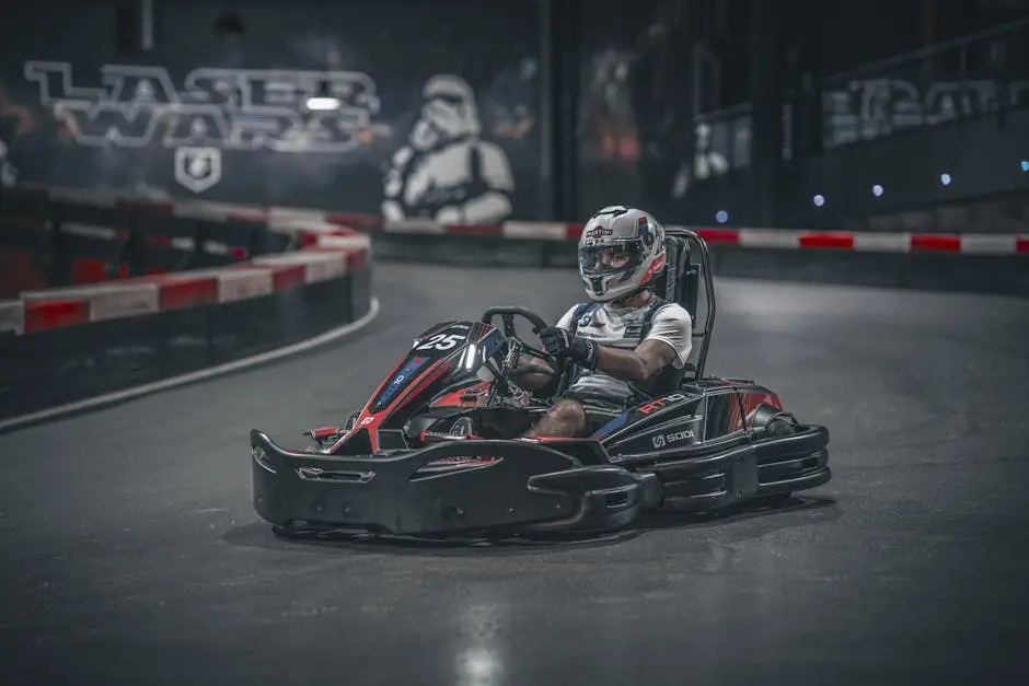 Exciting indoor go-kart racing scene with driver speeding on track.